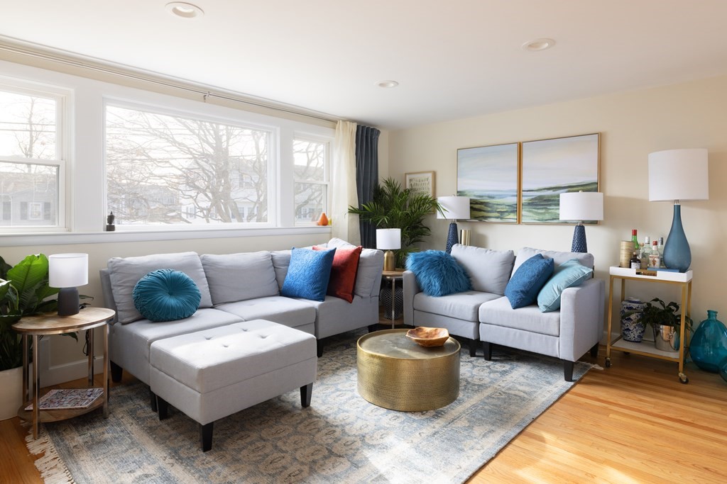 15 Wheaton Road Arlington, MA 02474 - Photo 2 of 19 a living room with furniture and a large window