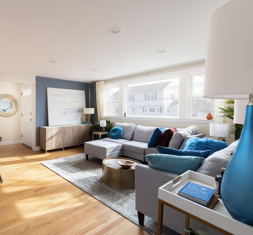15 Wheaton Road Arlington, MA 02474 - Photo 3 of 19 a living room with furniture and a large window