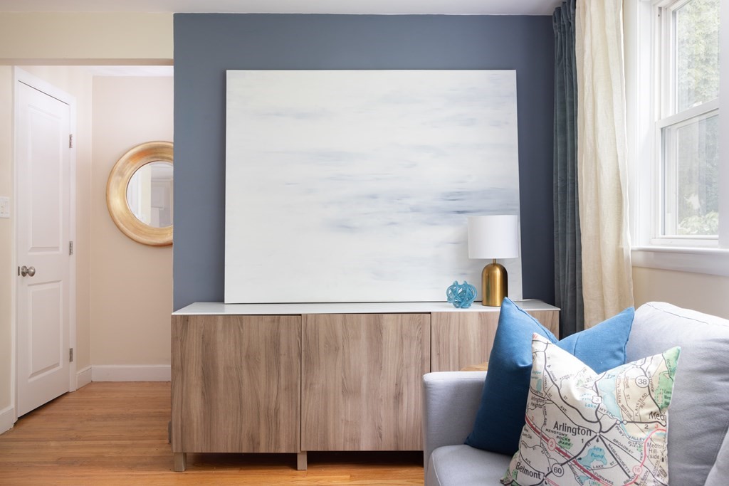15 Wheaton Road Arlington, MA 02474 - Photo 4 of 19 a living room with a couch and a window