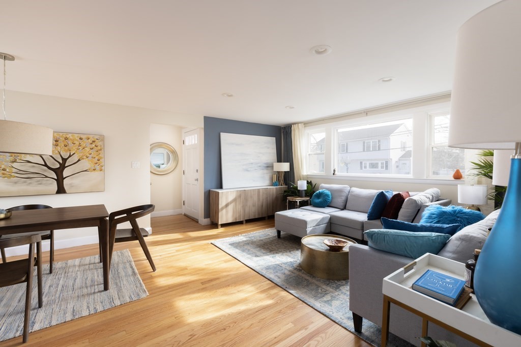 15 Wheaton Road Arlington, MA 02474 - Photo 5 of 19 a living room with furniture and a large window