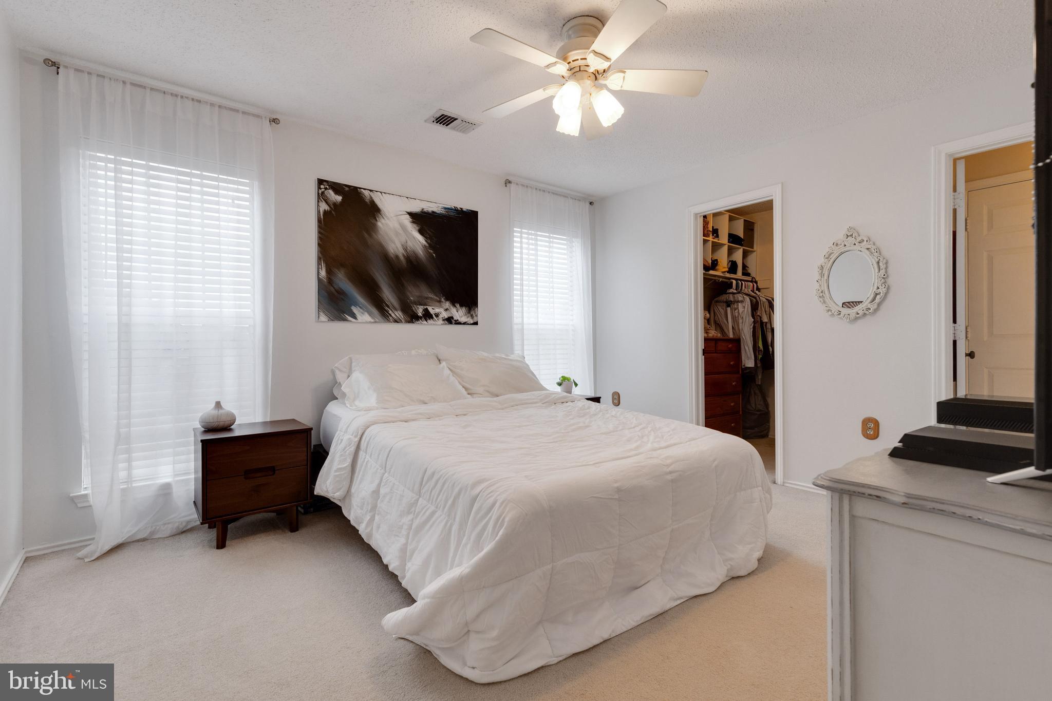 21033 Timber Ridge Terrace, Unit 302 Ashburn, VA 20147 - Photo 14 of 24 Master with Walk-in Closet & En Suite Bathroom