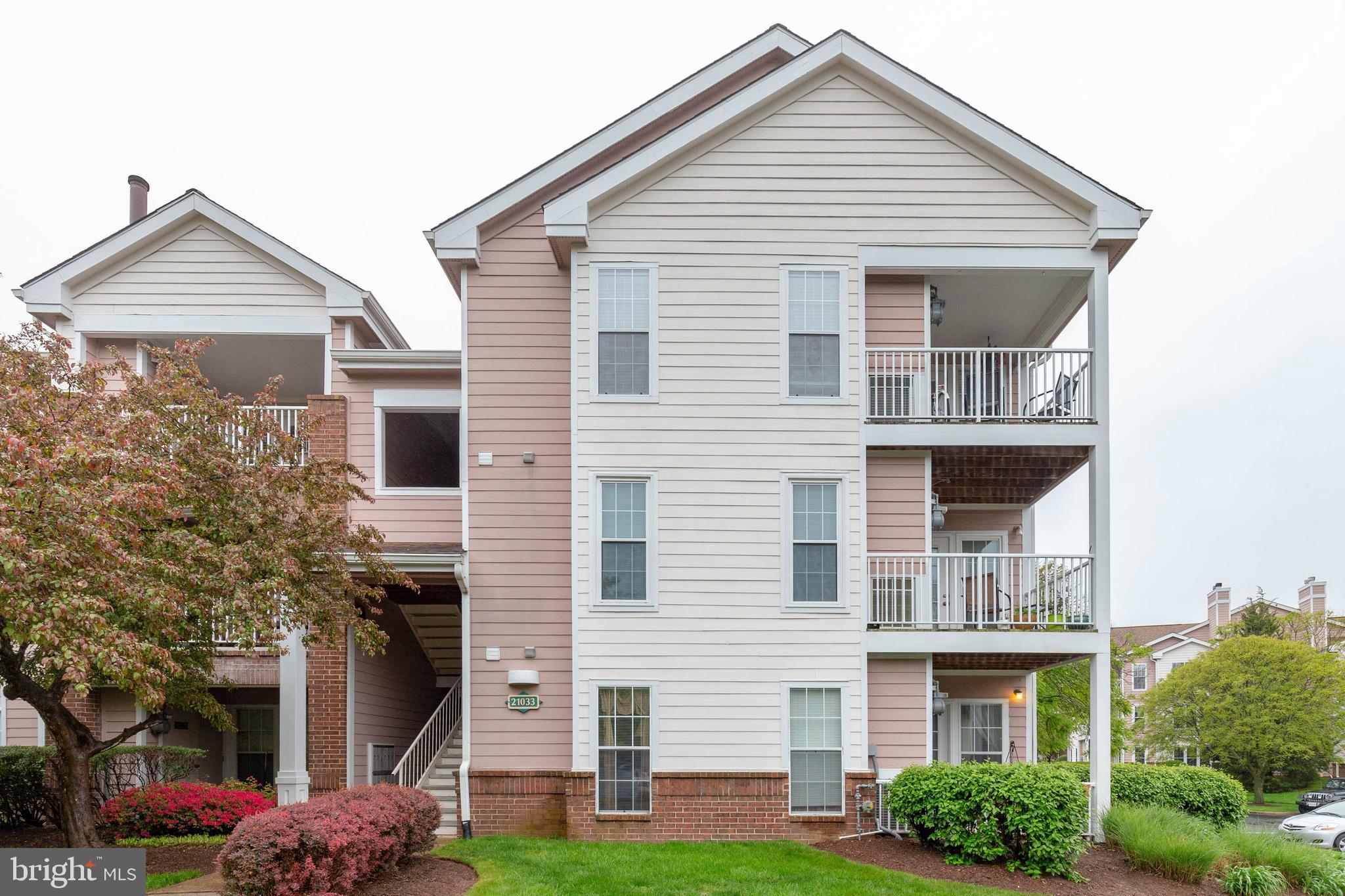 21033 Timber Ridge Terrace, Unit 302 Ashburn, VA 20147 - Photo 22 of 24 Enjoy the Spring Air from Your Balcony