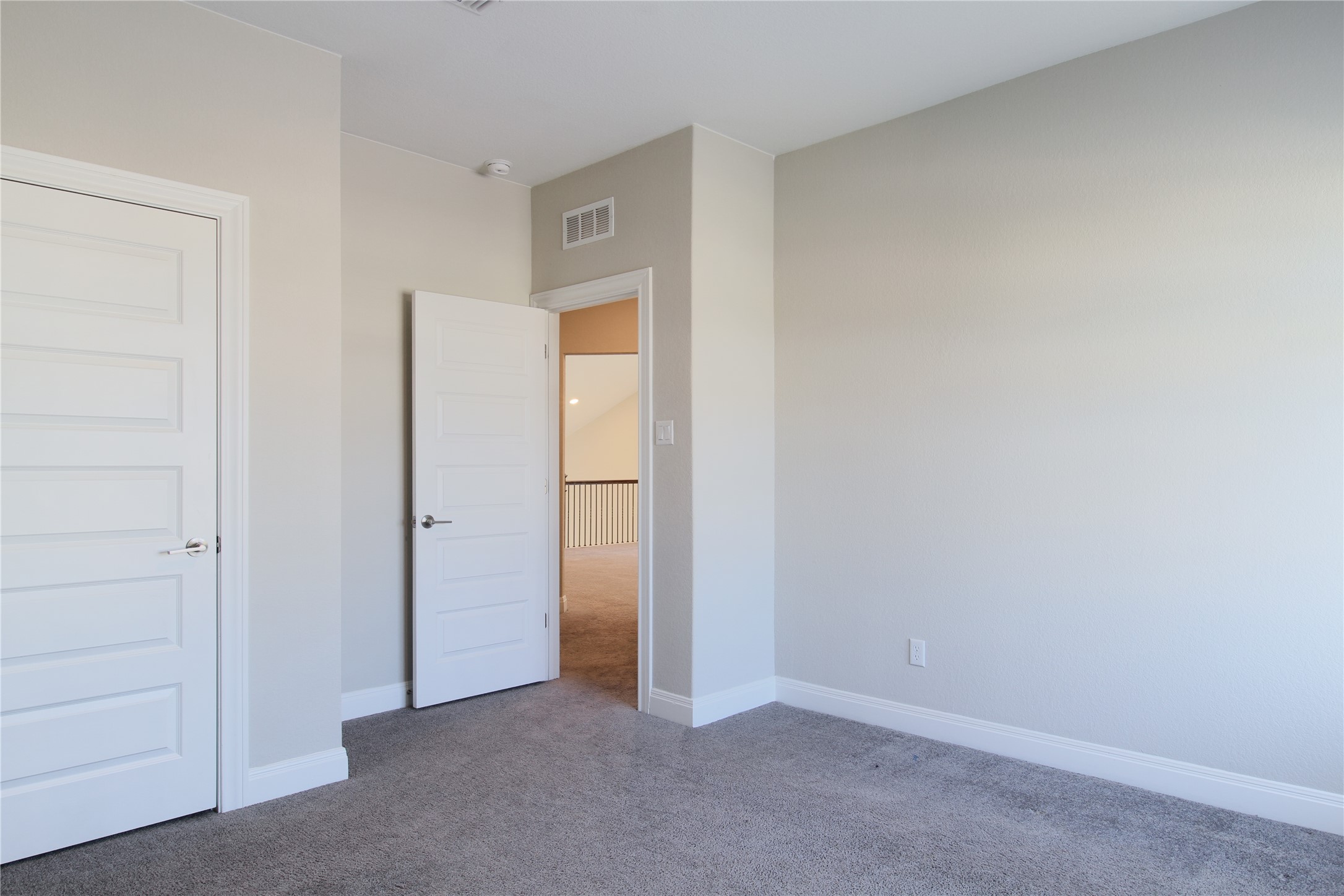 109 Yellow Thistle Cove Georgetown, TX 78626 - Photo 11 of 36 Carpeted room with light neutral wall paint and white trim