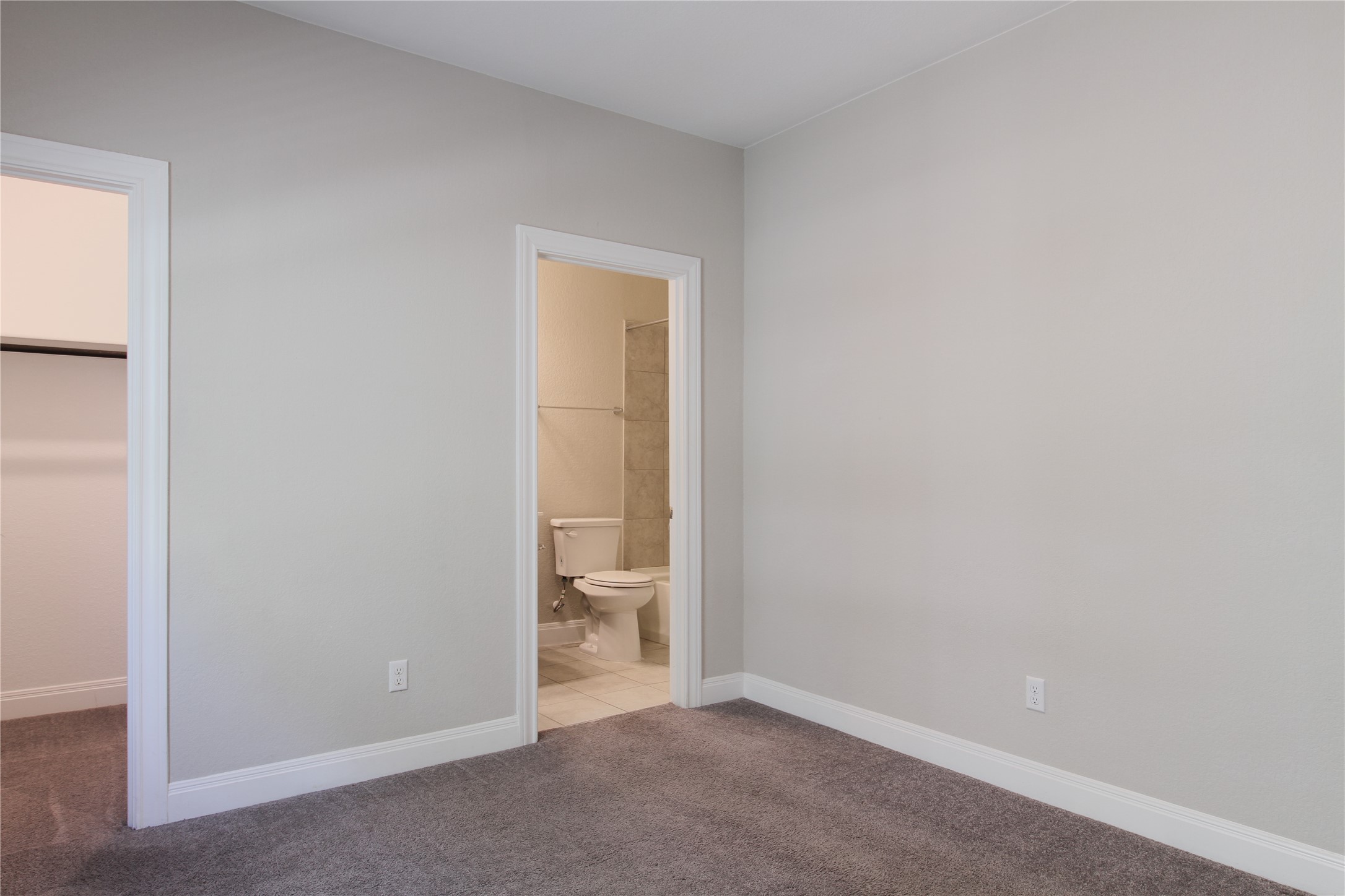 109 Yellow Thistle Cove Georgetown, TX 78626 - Photo 18 of 36 Carpeted interior space featuring light gray walls and white trim