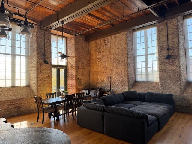 1201 Front Avenue, Unit 203 Columbus, GA 31901 - Photo 18 of 54 a living room with furniture and a table