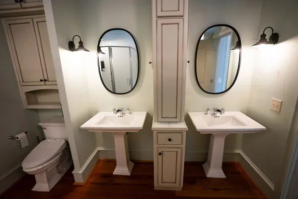 a bathroom with a shower and toilet