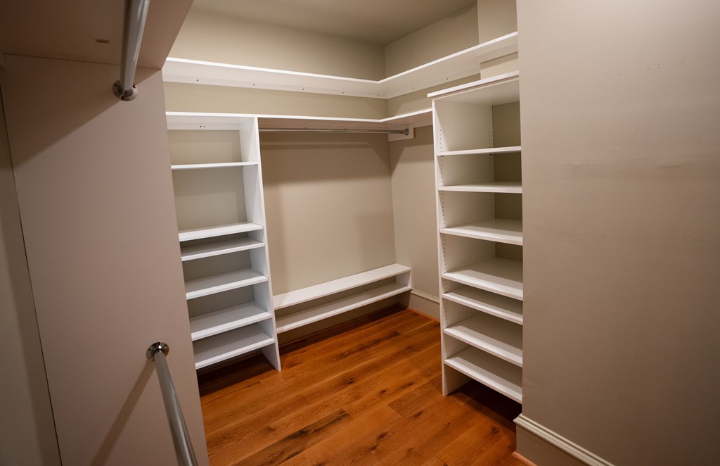 1201 Front Avenue, Unit 203 Columbus, GA 31901 - Photo 36 of 54 a view of walk in closet with empty racks