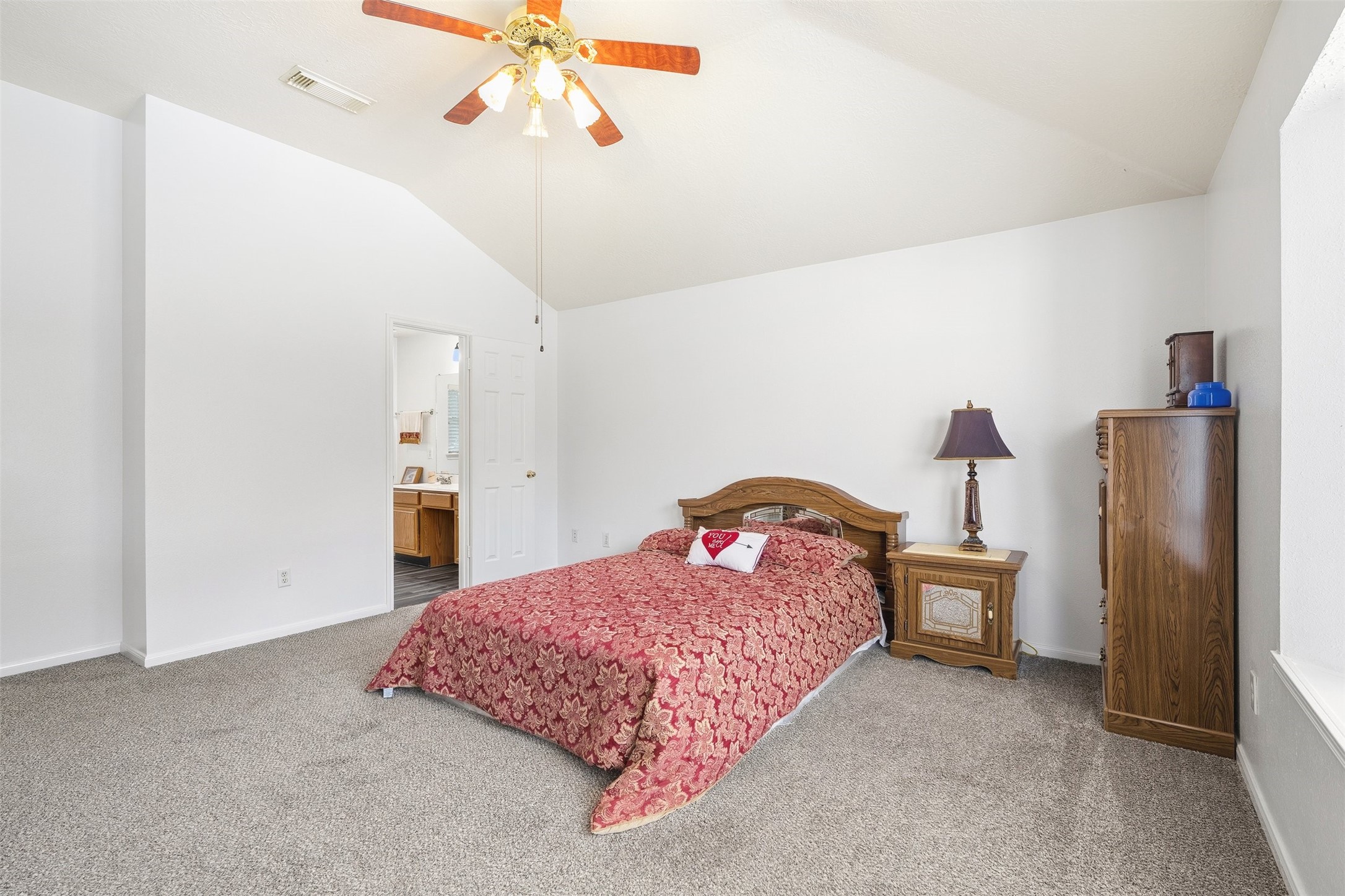28723 Sedgefield Street Spring, TX 77386 - Photo 11 of 20 a bedroom with a bed and cabinets
