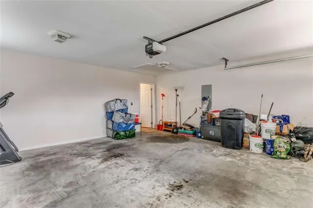 a view of a livingroom with furniture and a window