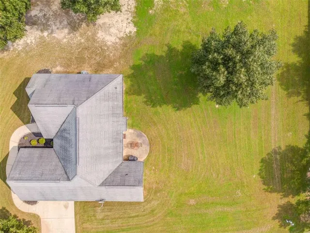 a view of houses with swimming pool