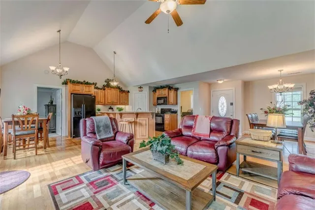 a view of a house with a yard and plants