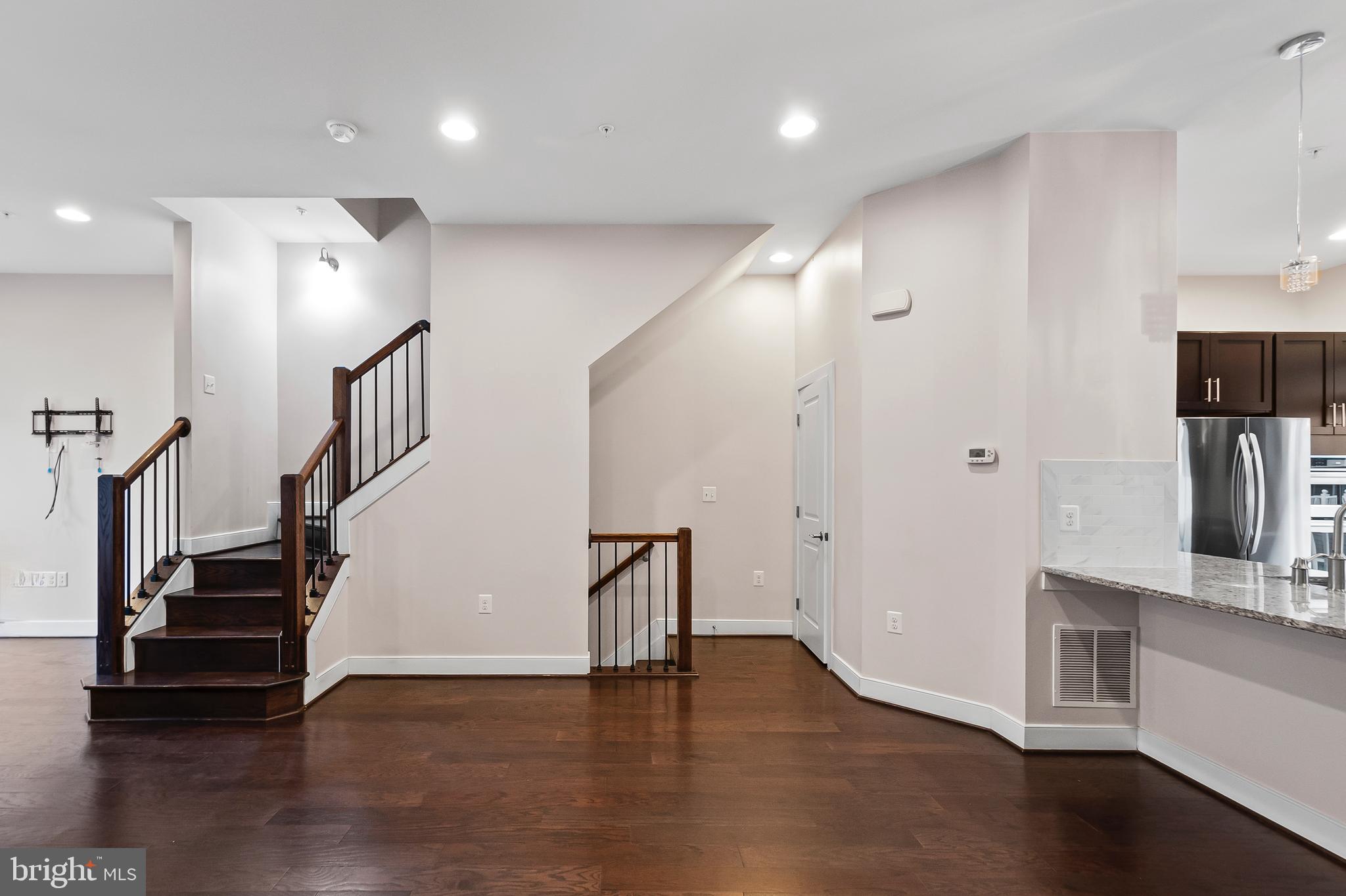 1417 Van Valkenburgh Lane Alexandria, VA 22301 - Photo 13 of 45 a view of entryway with wooden floor and stairs