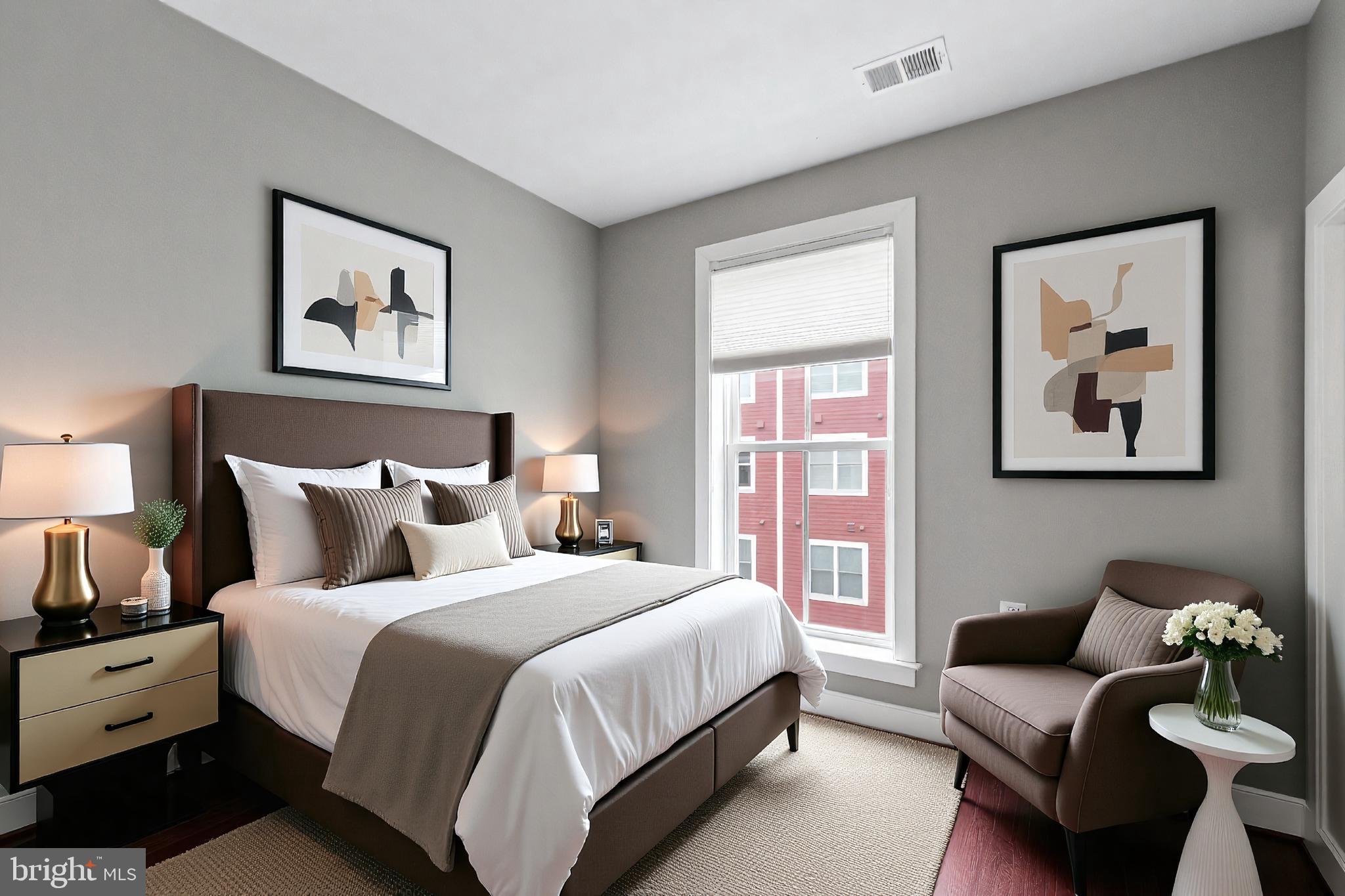 1417 Van Valkenburgh Lane Alexandria, VA 22301 - Photo 24 of 45 a spacious bedroom with a bed and a couch