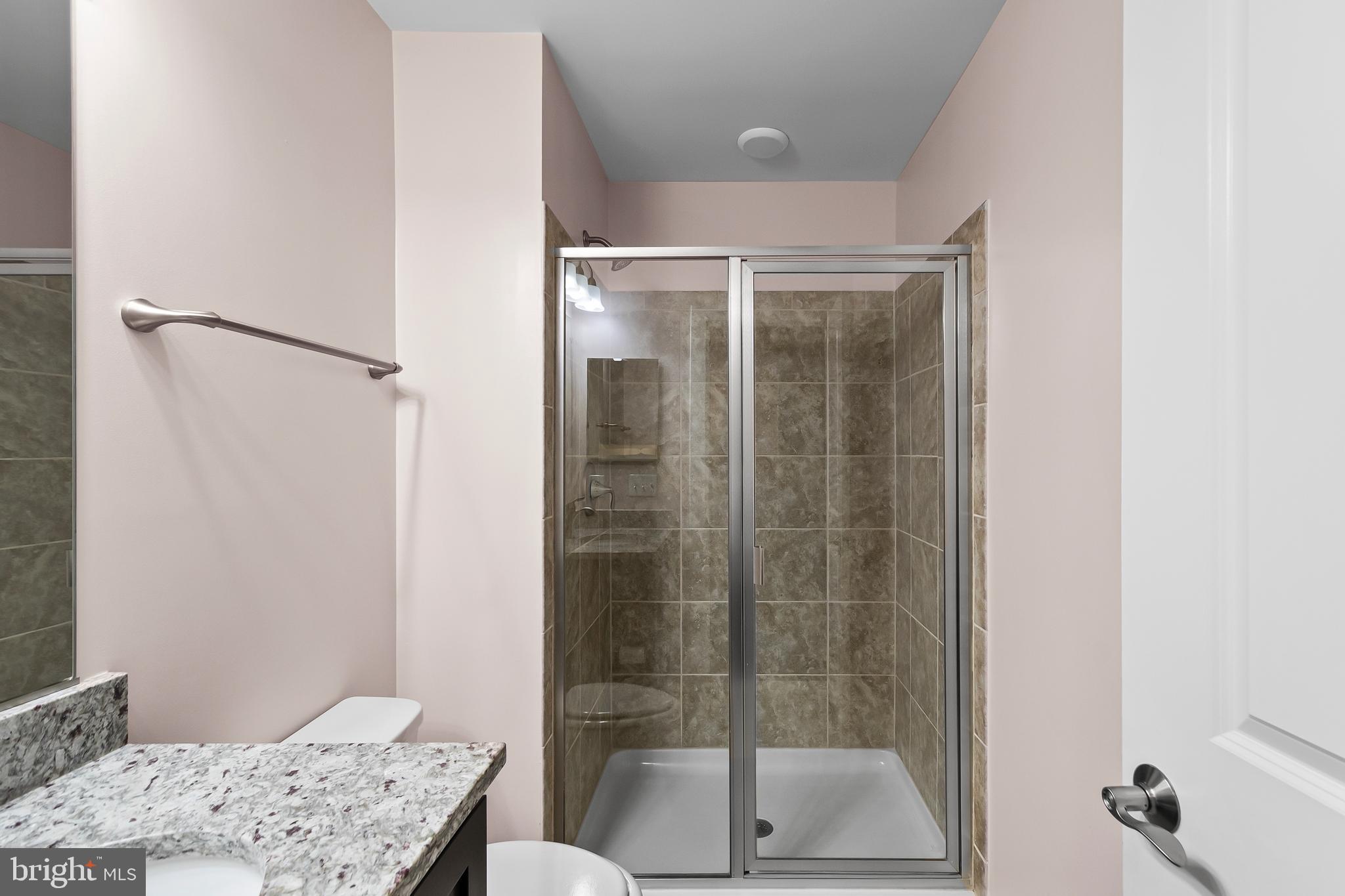 1417 Van Valkenburgh Lane Alexandria, VA 22301 - Photo 35 of 45 a bathroom with a shower and a sink