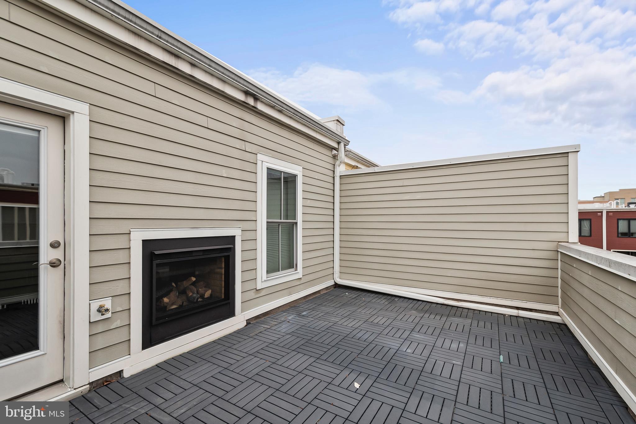1417 Van Valkenburgh Lane Alexandria, VA 22301 - Photo 37 of 45 a view of a livingroom with a fireplace