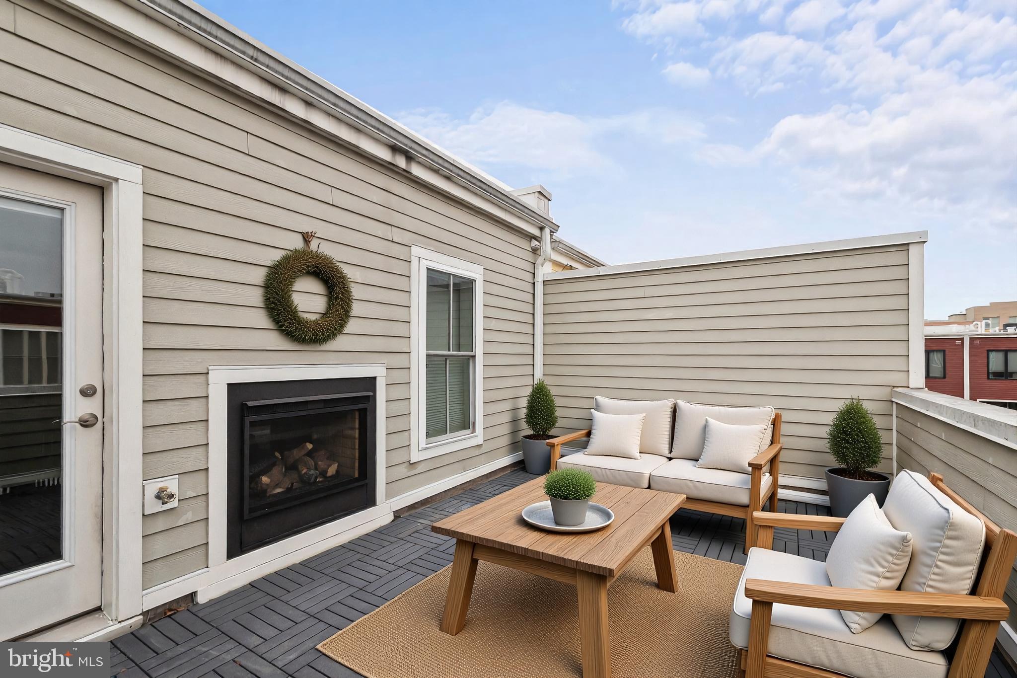 1417 Van Valkenburgh Lane Alexandria, VA 22301 - Photo 38 of 45 a living room with furniture and a fireplace