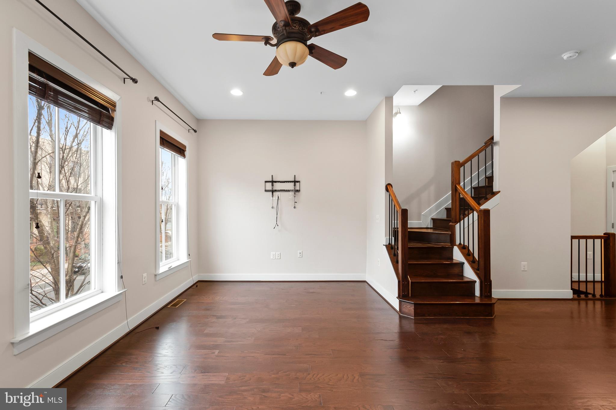1417 Van Valkenburgh Lane Alexandria, VA 22301 - Photo 9 of 45 a view of empty room with wooden floor and fan
