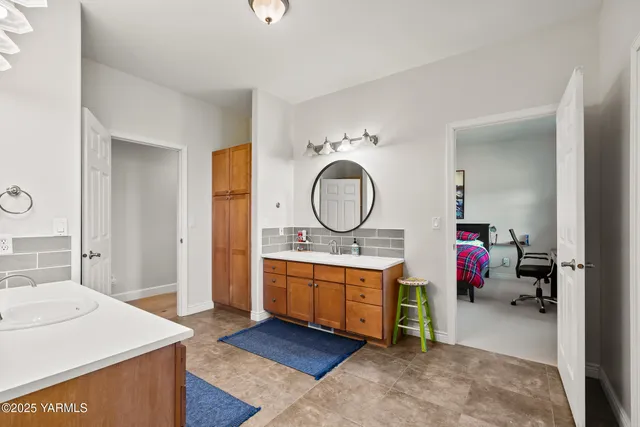 a bedroom with a bed furniture and a window