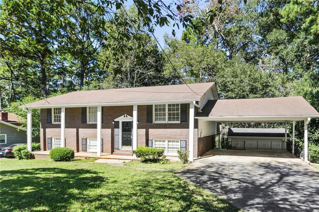 2143 Chevy Chase Lane Decatur, GA 30032 - Photo 1 of 1 front view of a house with a yard