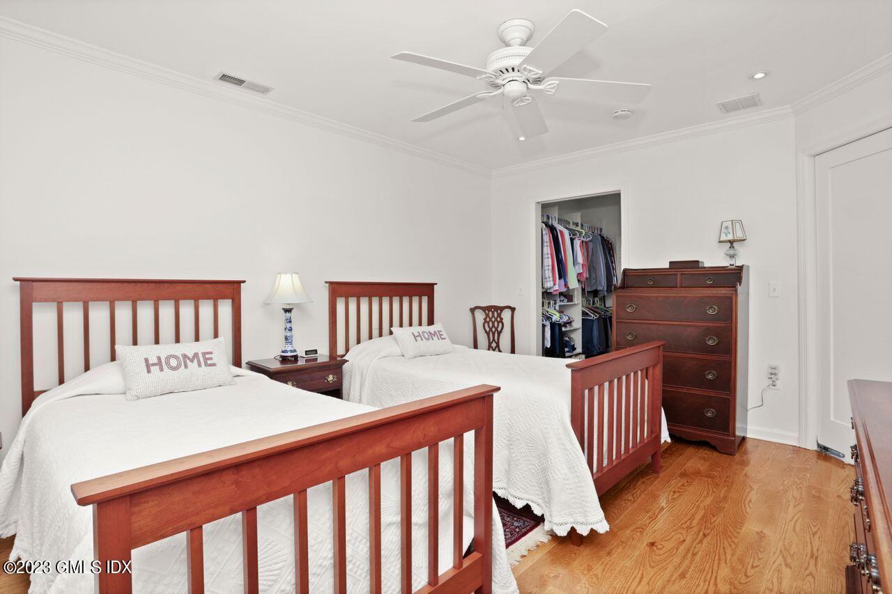 1 Shore Road, Unit 3 Stamford, CT 06902 - Photo 25 of 37 a bedroom with two beds and a dresser