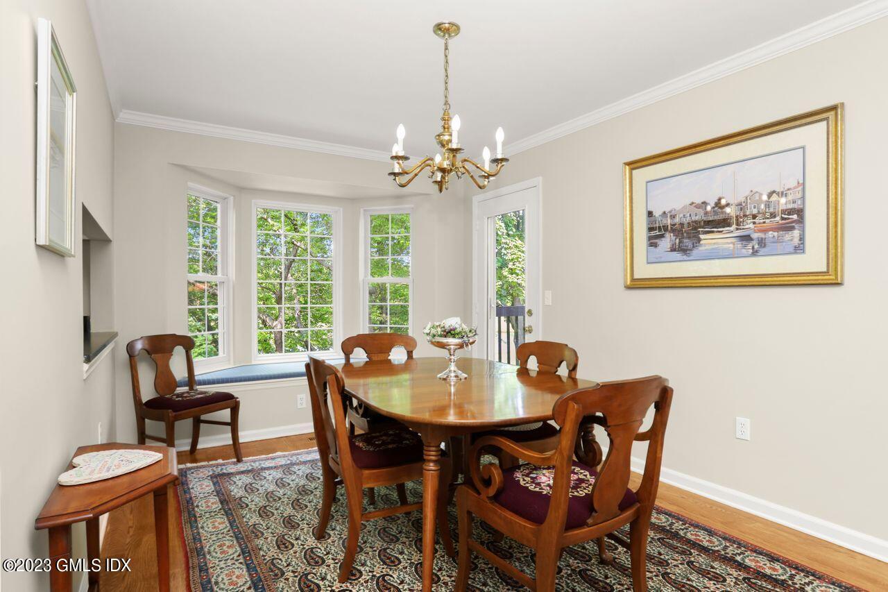 1 Shore Road, Unit 3 Stamford, CT 06902 - Photo 10 of 37 a dining room with furniture and window
