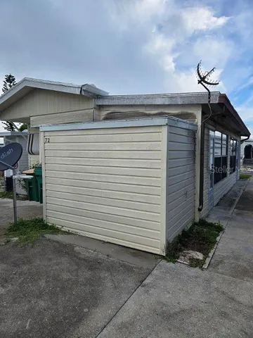 a view of a house with a garage