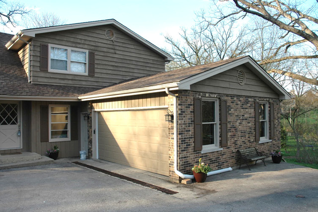 42-w174 Timber Trail St. Charles, IL 60175 - Photo 3 of 21 a front view of a house with a yard