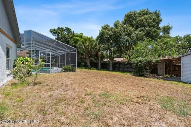 a house with trees in front of it