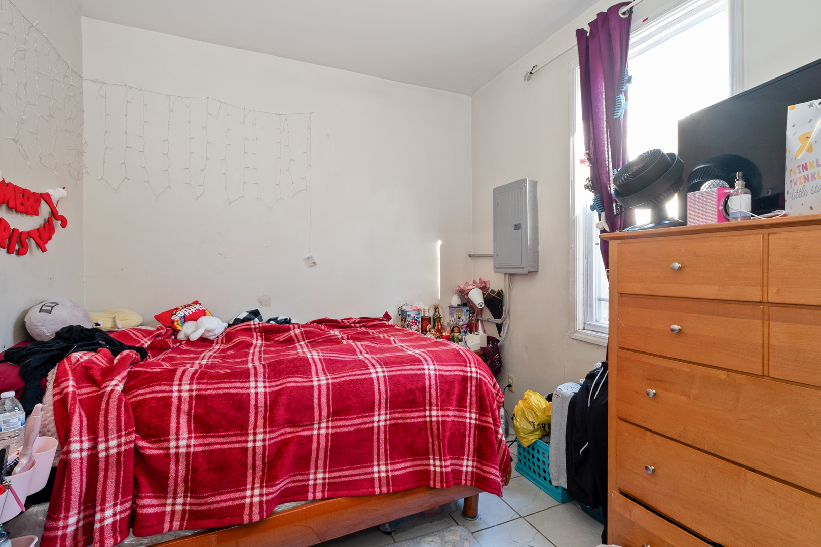 2857 South Kostner Avenue Chicago, IL 60623 - Photo 21 of 21 a bedroom with a bed and a dresser