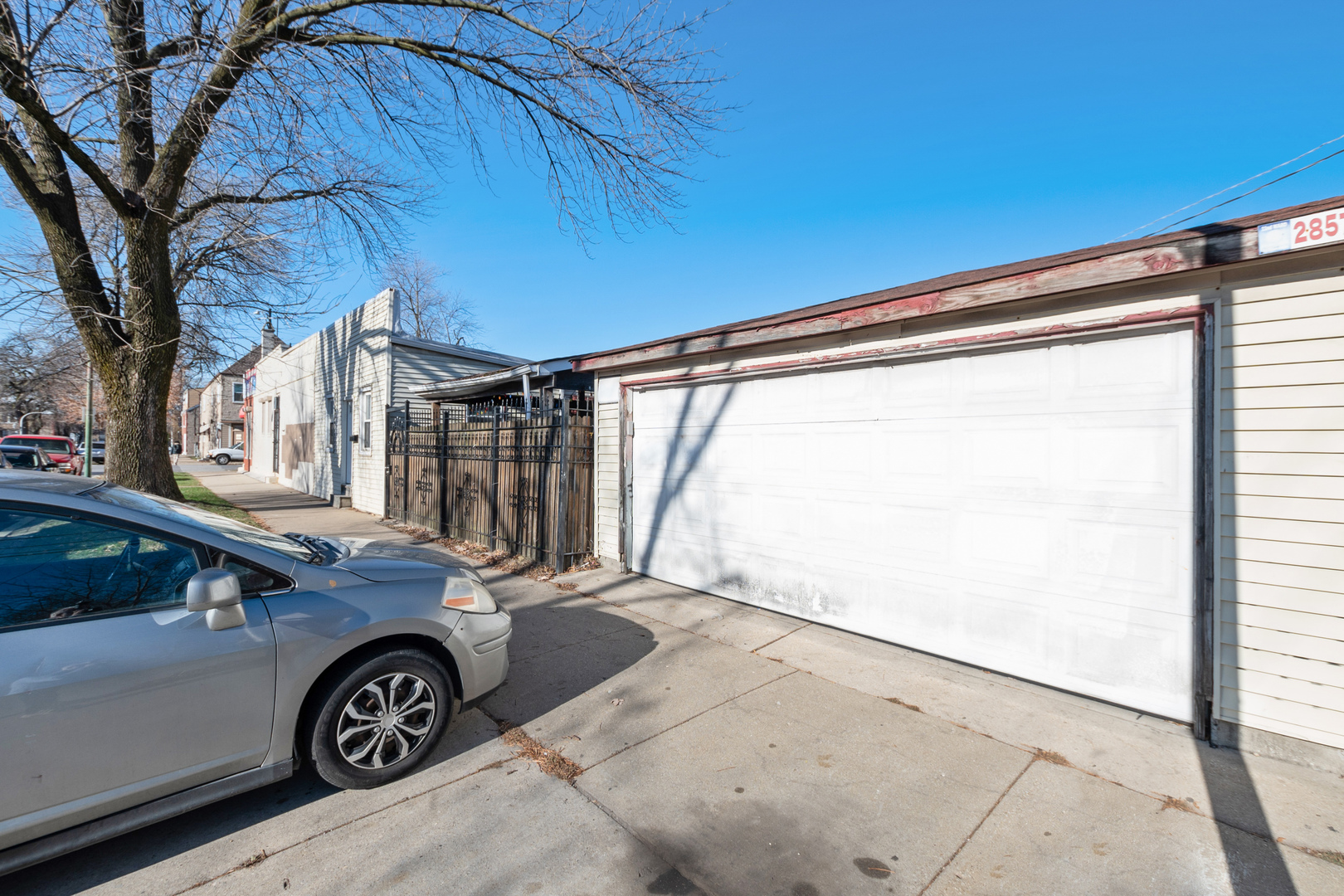 2857 South Kostner Avenue Chicago, IL 60623 - Photo 6 of 21 a view of a car in front of a house