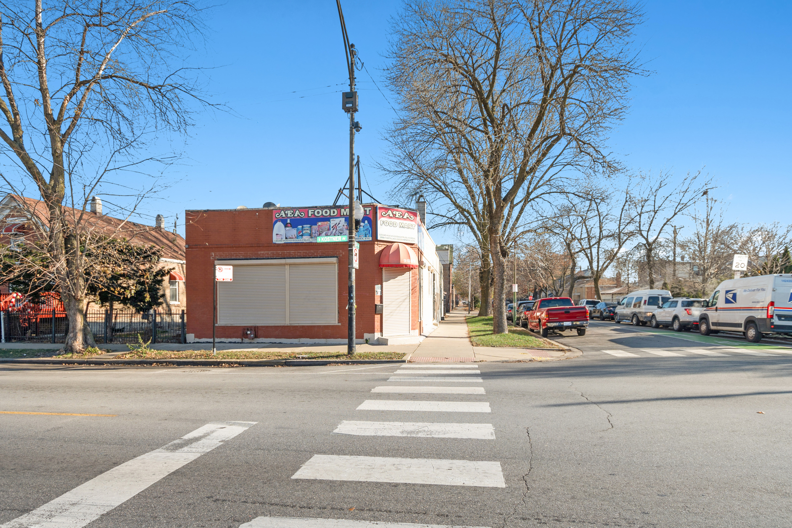 2857 South Kostner Avenue Chicago, IL 60623 - Photo 7 of 21 a view of a city street lined with buildings and trees