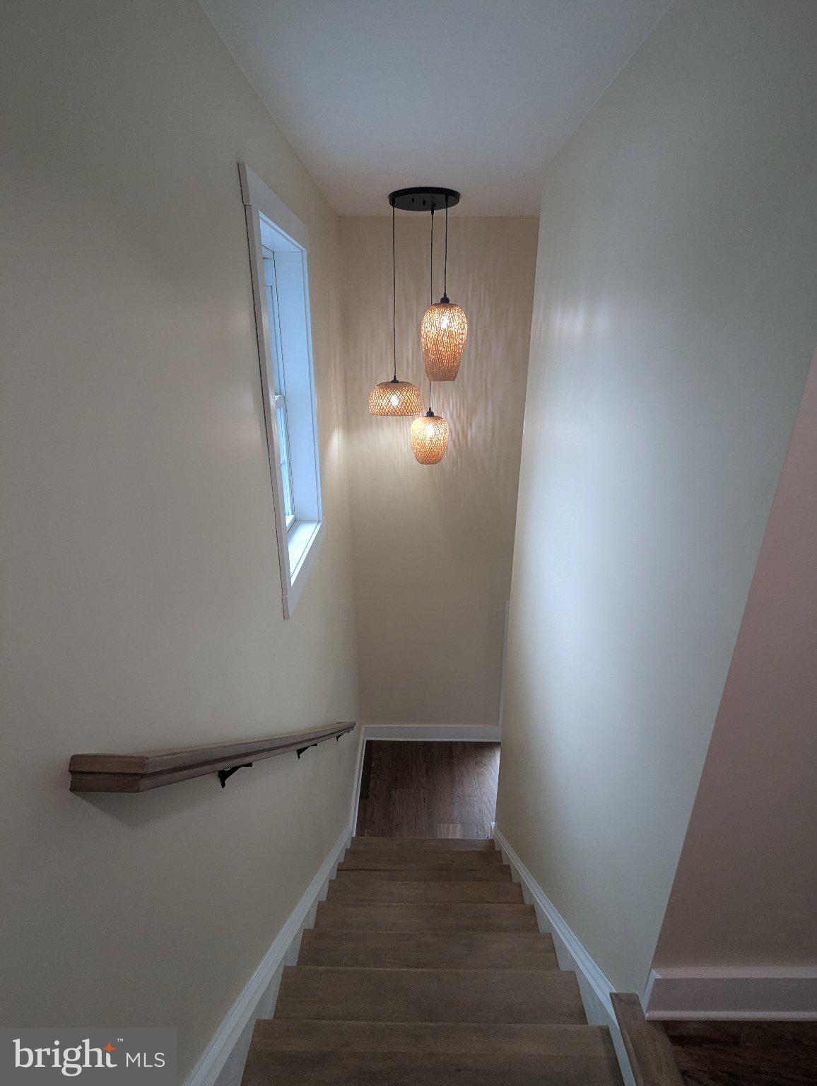 928 Goodyear Road Gardners, PA 17324 - Photo 14 of 33 Inviting stairway with warm lighting.