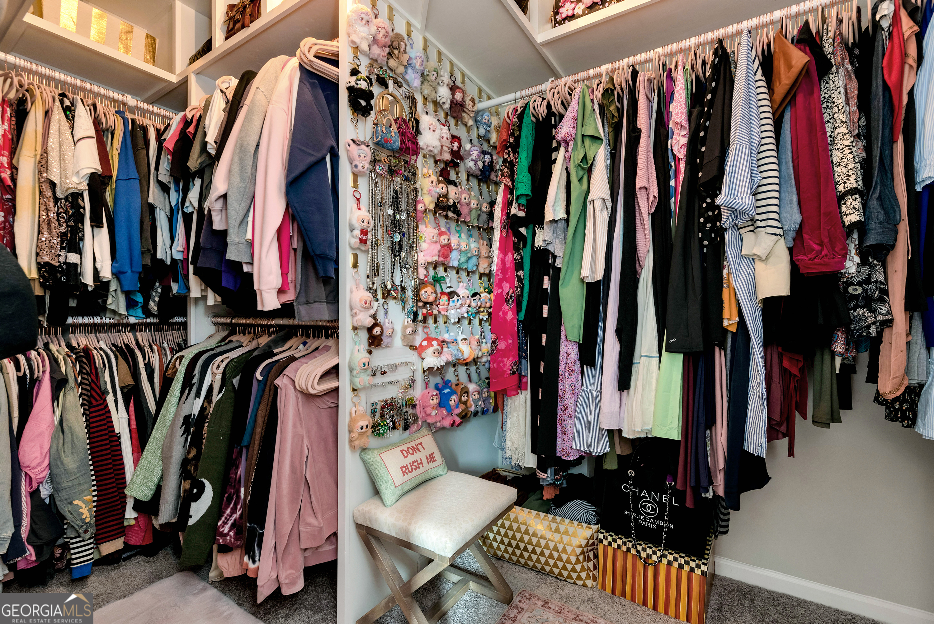 425 Crystal Way Cornelia, GA 30531 - Photo 18 of 46 a view of walk in closet with clothes