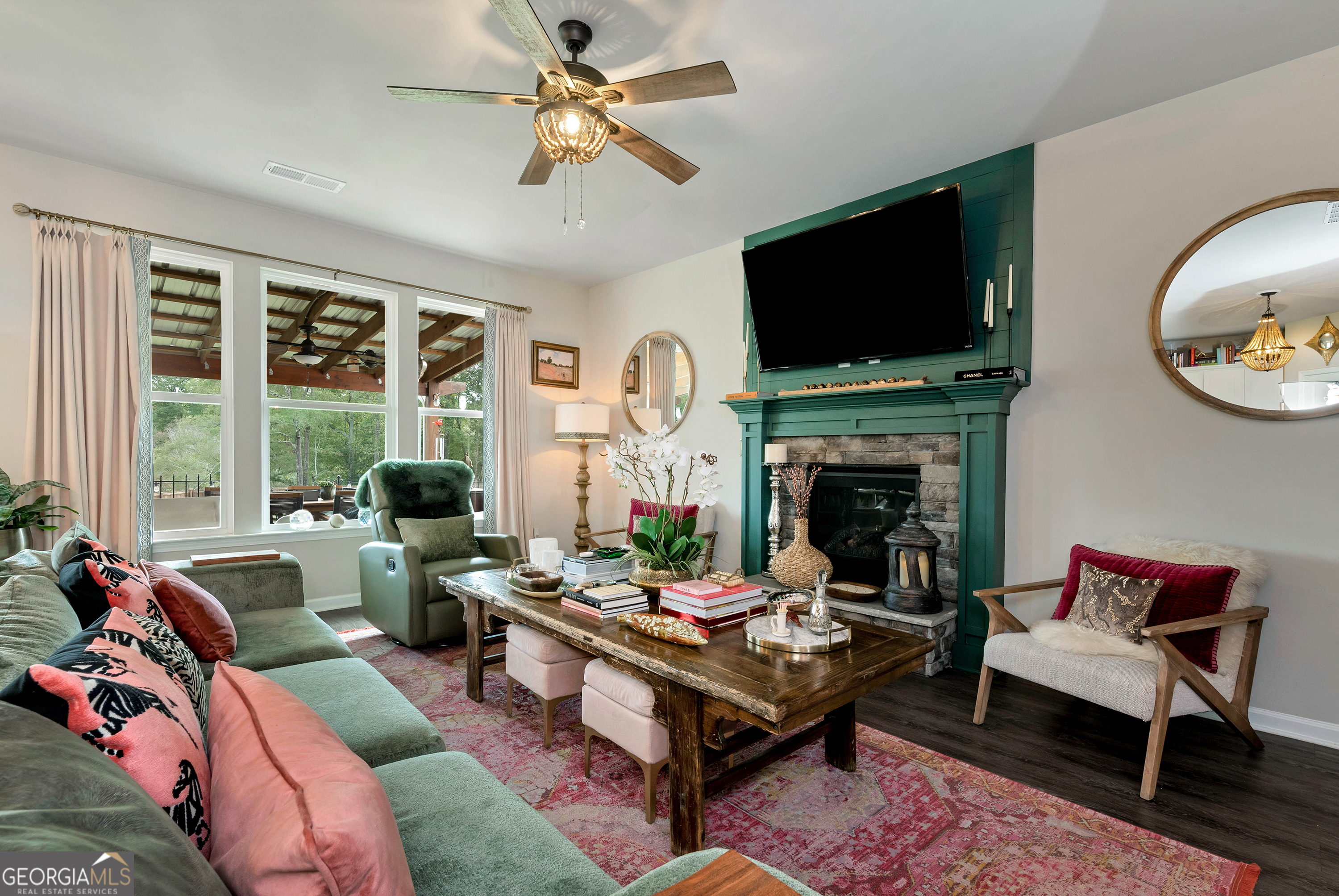 425 Crystal Way Cornelia, GA 30531 - Photo 3 of 46 a living room with furniture fireplace and a flat screen tv