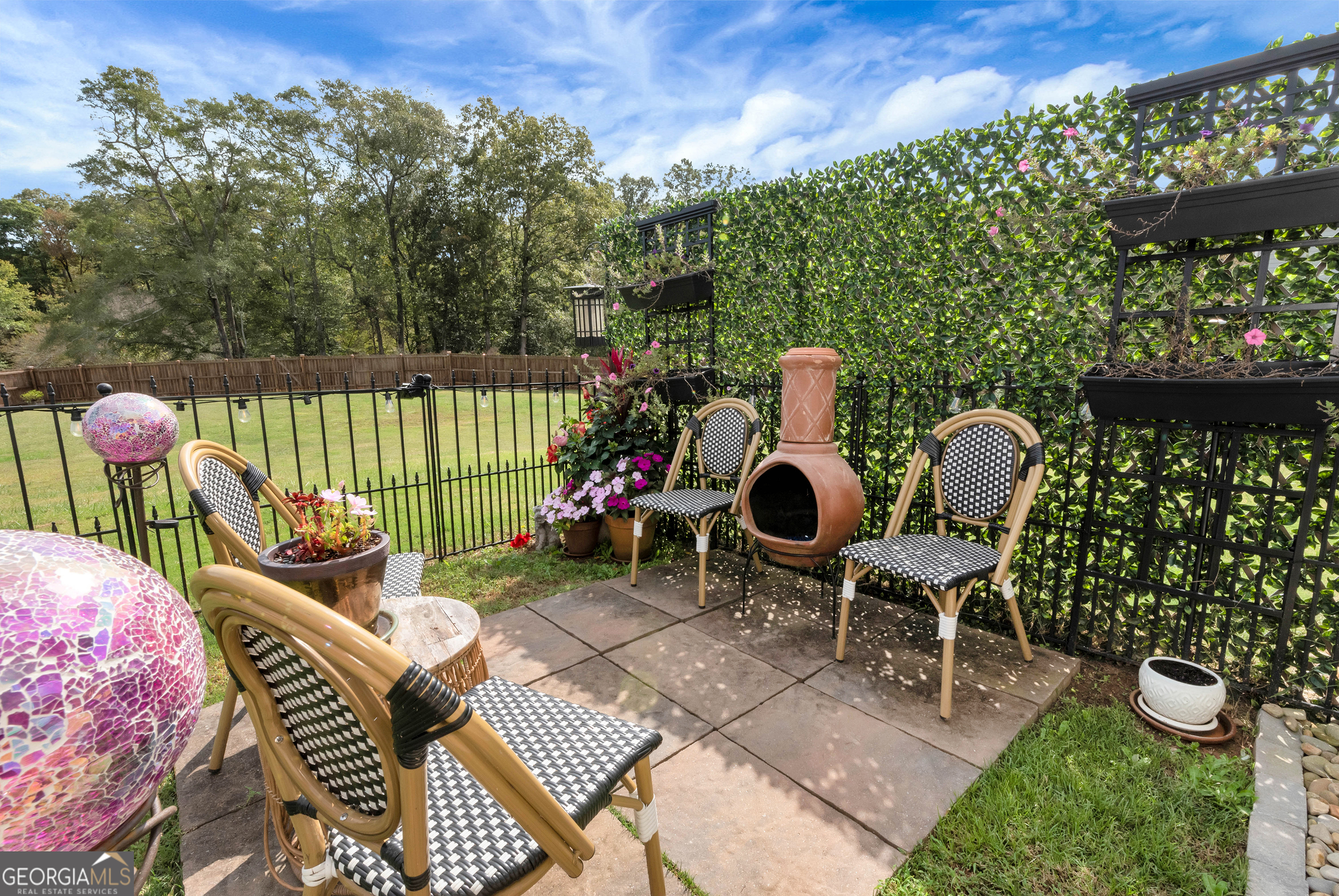 425 Crystal Way Cornelia, GA 30531 - Photo 44 of 46 a view of a chairs and table in backyard