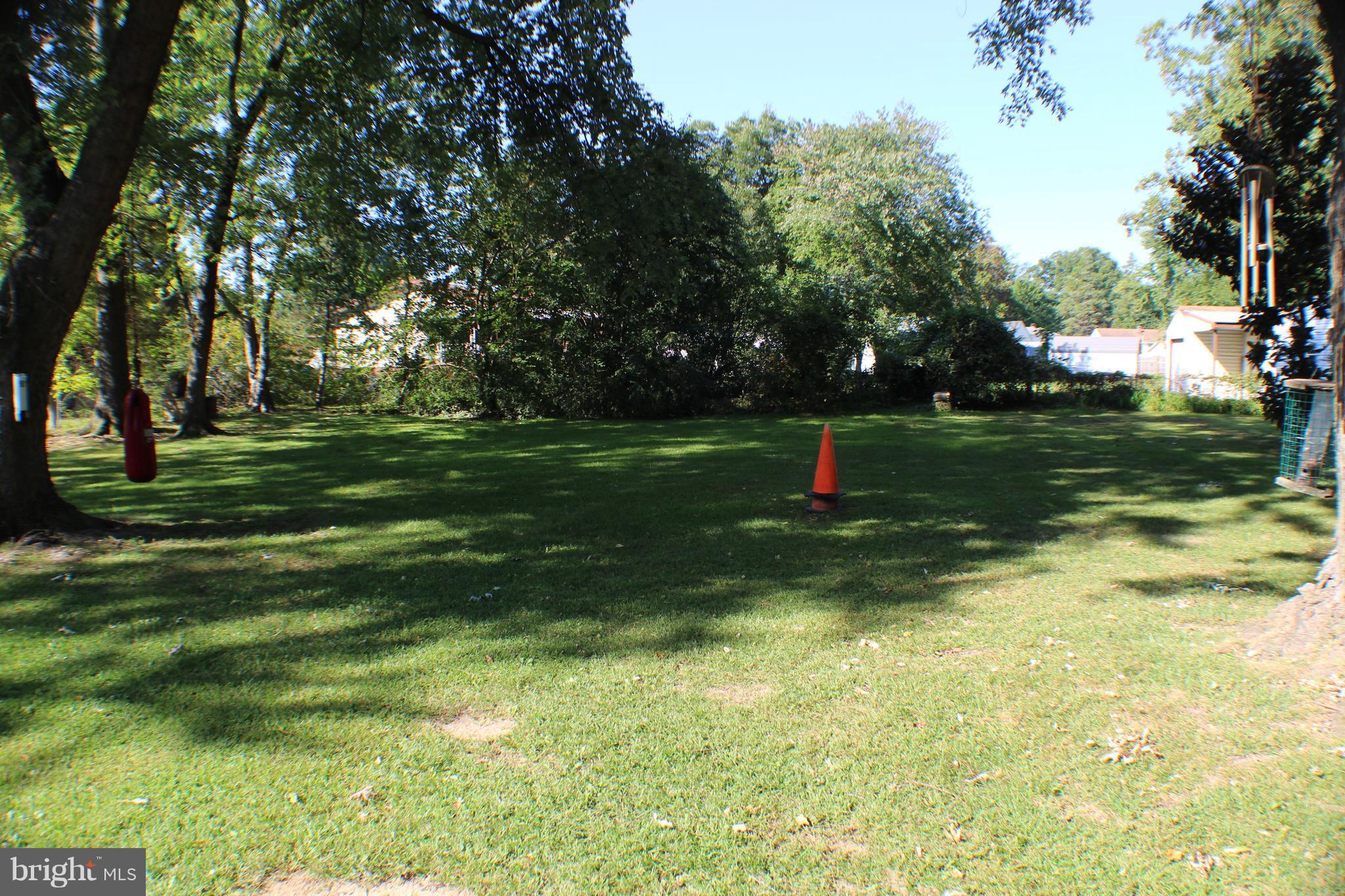 332 Worton Road Baltimore, MD 21221 - Photo 11 of 18 a view of a park with large trees