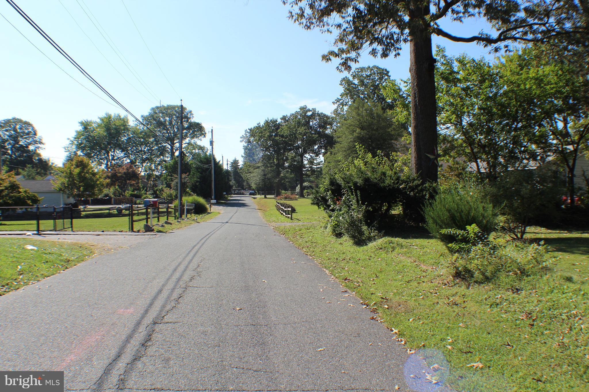 332 Worton Road Baltimore, MD 21221 - Photo 14 of 18 a view of a park with large trees
