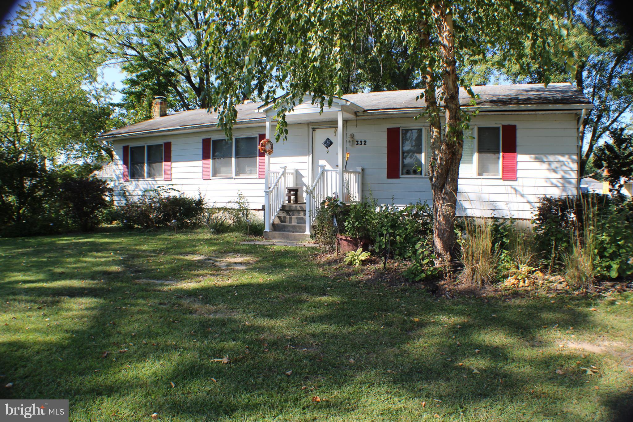 332 Worton Road Baltimore, MD 21221 - Photo 18 of 18 a front view of house with yard and green space