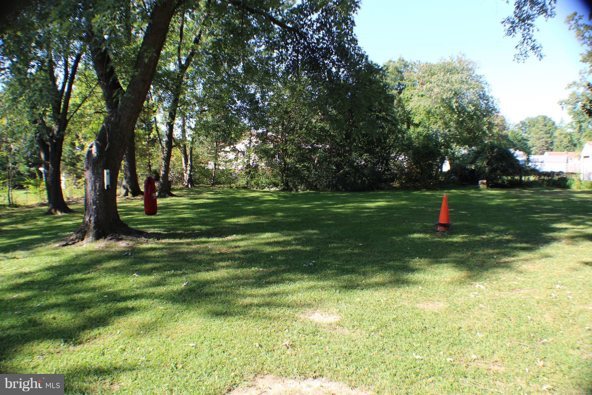 332 Worton Road Baltimore, MD 21221 - Photo 10 of 18 a view of a park with trees in the background