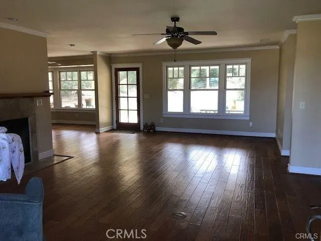 a view of livingroom with hardwood floor and window