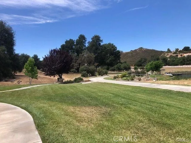 a view of a town with mountains in the background