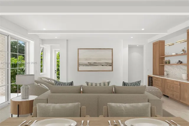 a kitchen with stainless steel appliances granite countertop a stove and a sink