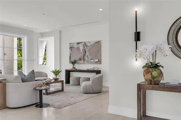 a living room with furniture and window