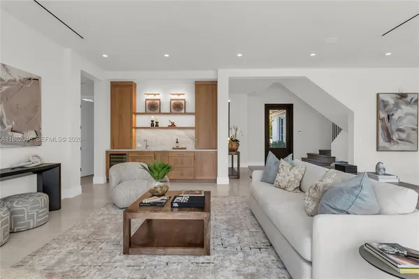 a living room with furniture and a couch