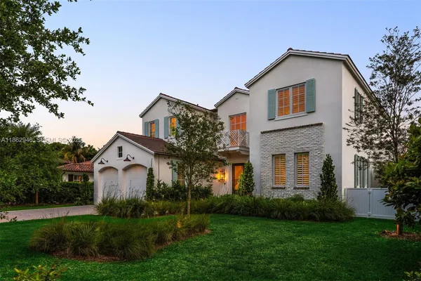 a bathroom with a sink a mirror and a bathtub