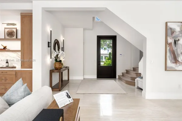a bathroom with a sink toilet a mirror and vanity