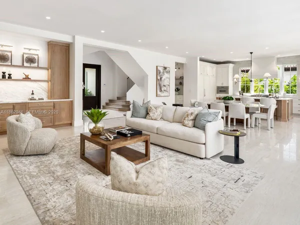 a spacious bathroom with a granite countertop sink a toilet and shower