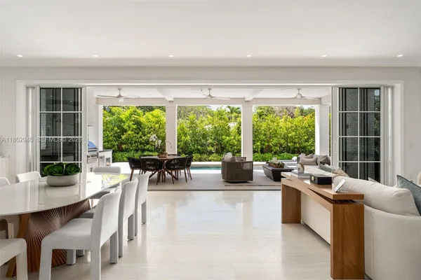 a bathroom with a double vanity sink a toilet and a mirror