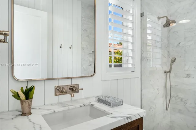 an aerial view of multiple houses with yard