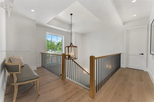 an aerial view of a house with outdoor space and street view